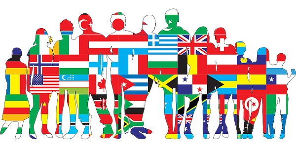 Symbolbild für Diversität. Umrisse von Menschen ausgefüllt mit verschiedenen Landesflaggen